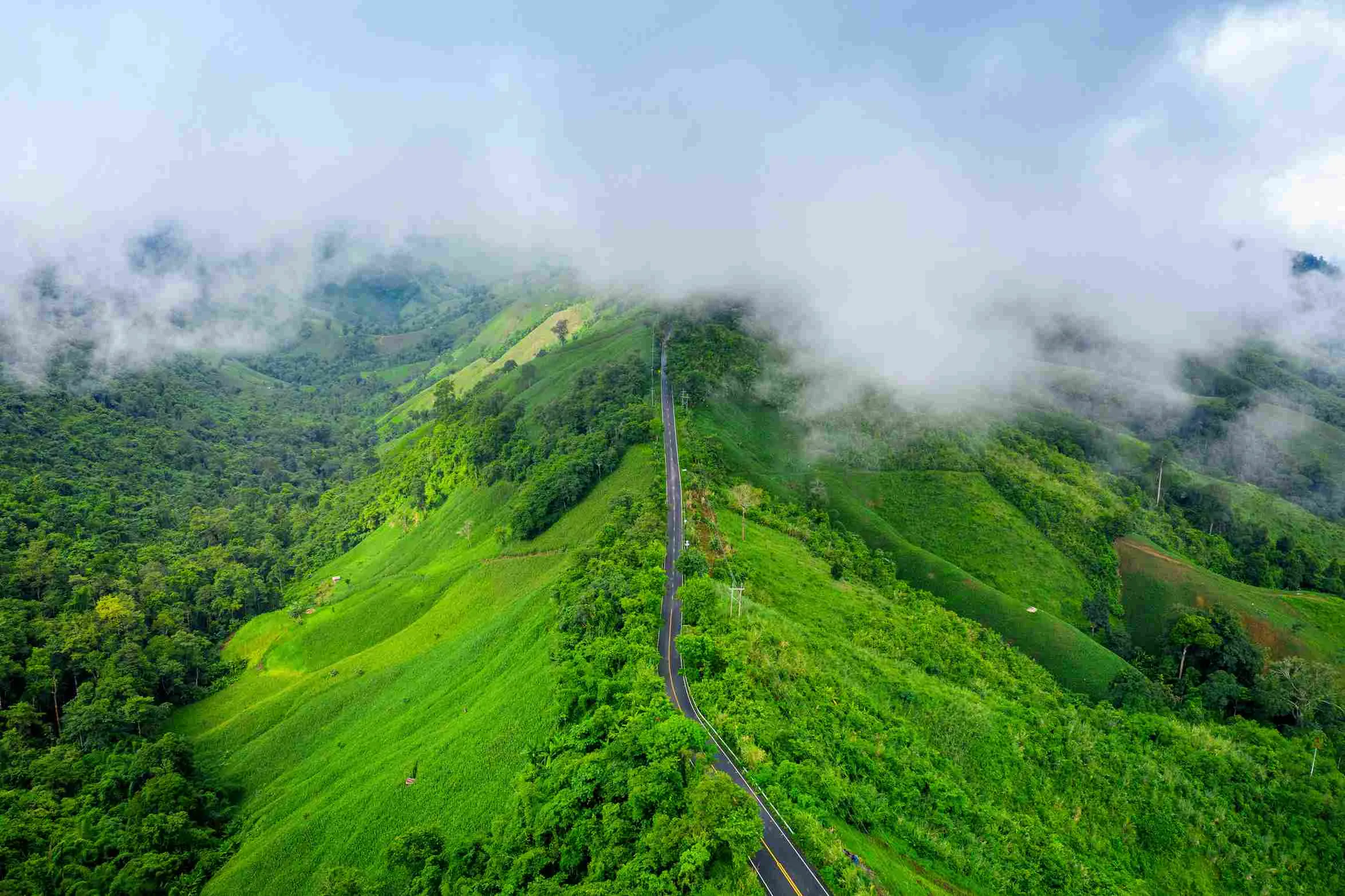 aerial-view-beautiful-sky-road-top-mountains-with-green-jungle-nan-province-thailand_11zon.webp