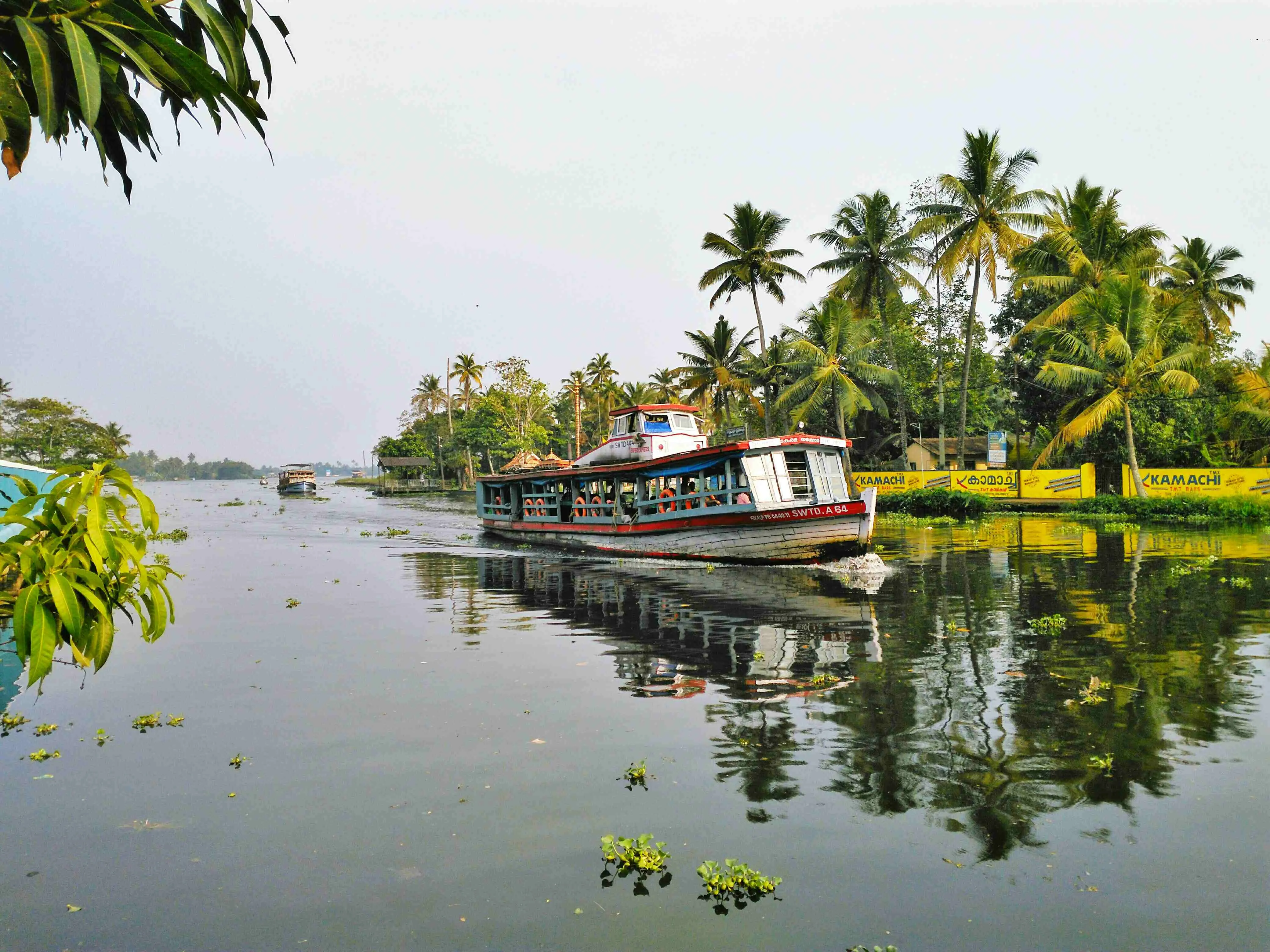boat-river-by-trees-against-sky_11zon.webp