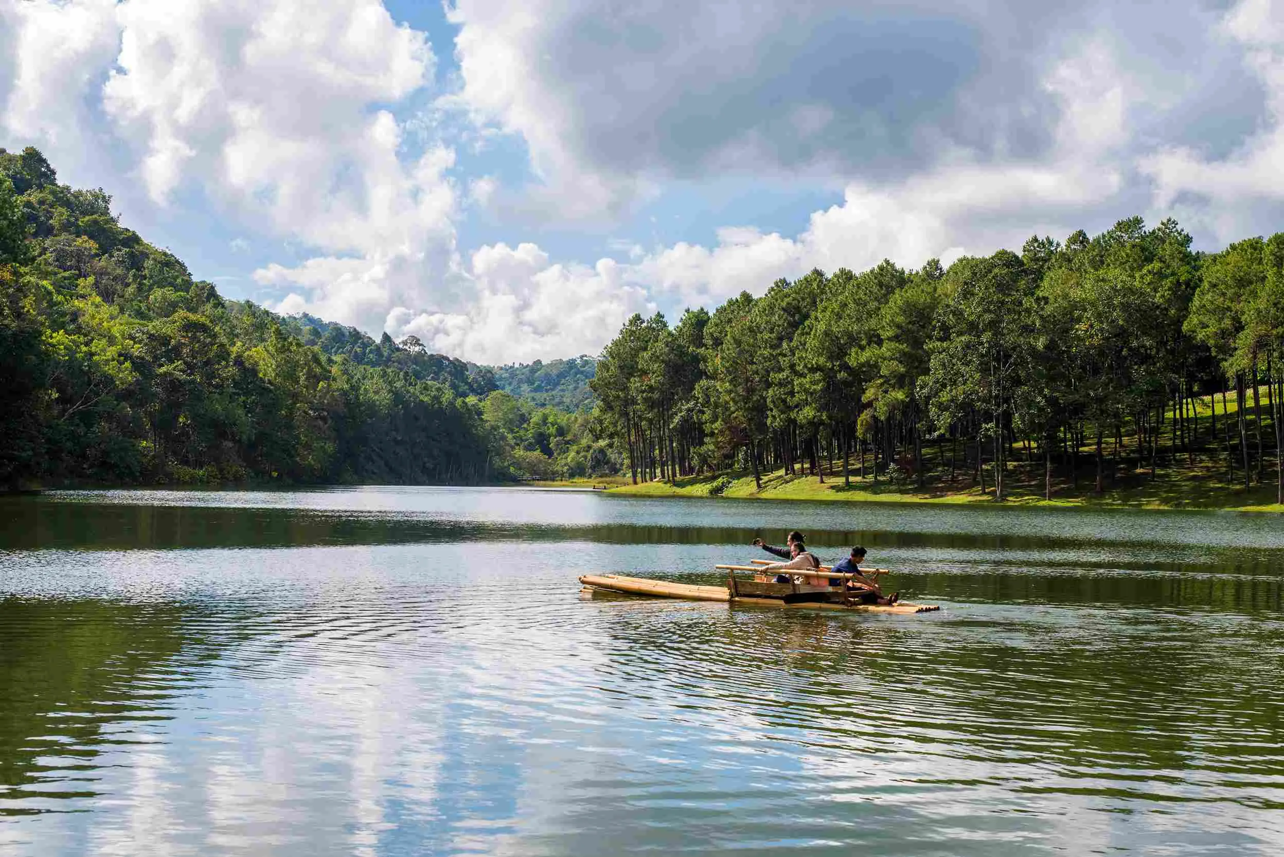 people-boat-lake-with-trees_11zon.webp