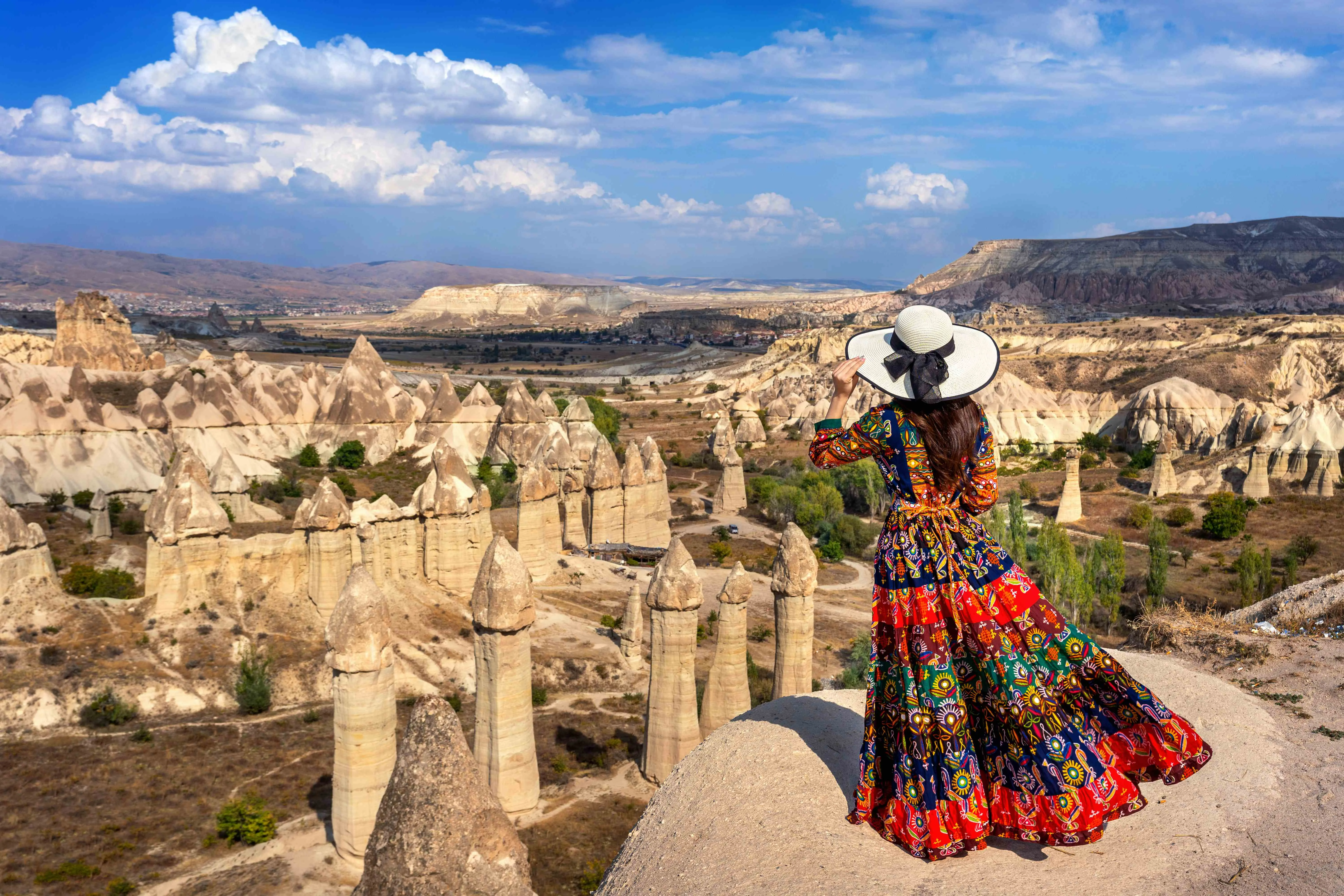 woman-bohemian-dress-standing-love-valley-cappadocia-turkey_11zon.webp